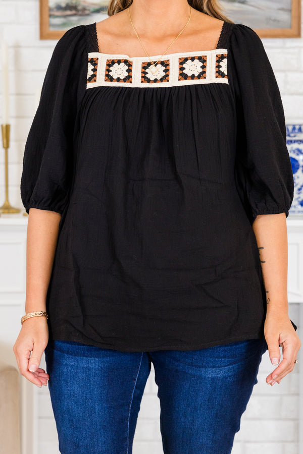 Chic Soul plus size clothing, short-puffed-sleeve black top with white and black knit granny squares along the square neckline and tie on the back of the top