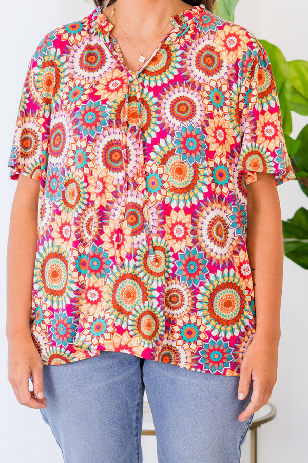 Plus Size fuchsia v-neck top with a vibrant floral mandala print and short sleeves.