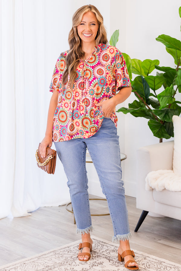 Plus Size fuchsia v-neck top with a vibrant floral mandala print and short sleeves.