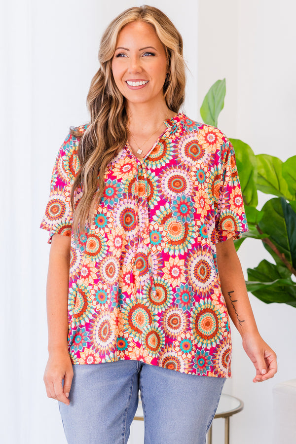 Plus Size fuchsia v-neck top with a vibrant floral mandala print and short sleeves.