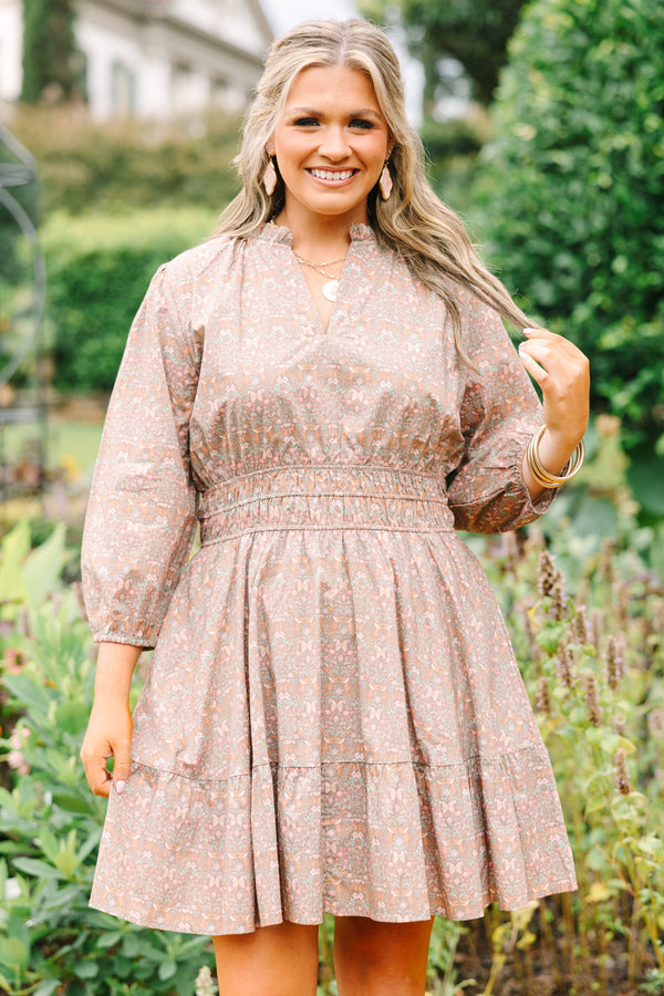 Plus Size brown floral cotton dress with a smocked waist, V-neckline, and three-quarter sleeves.