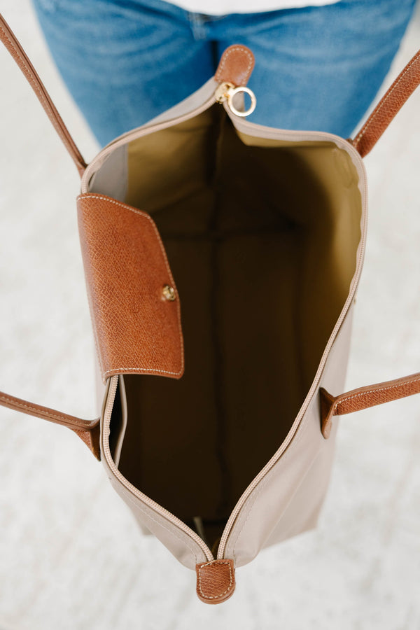 Gray nylon Jet Set Tote with brown leather straps and gold hardware.