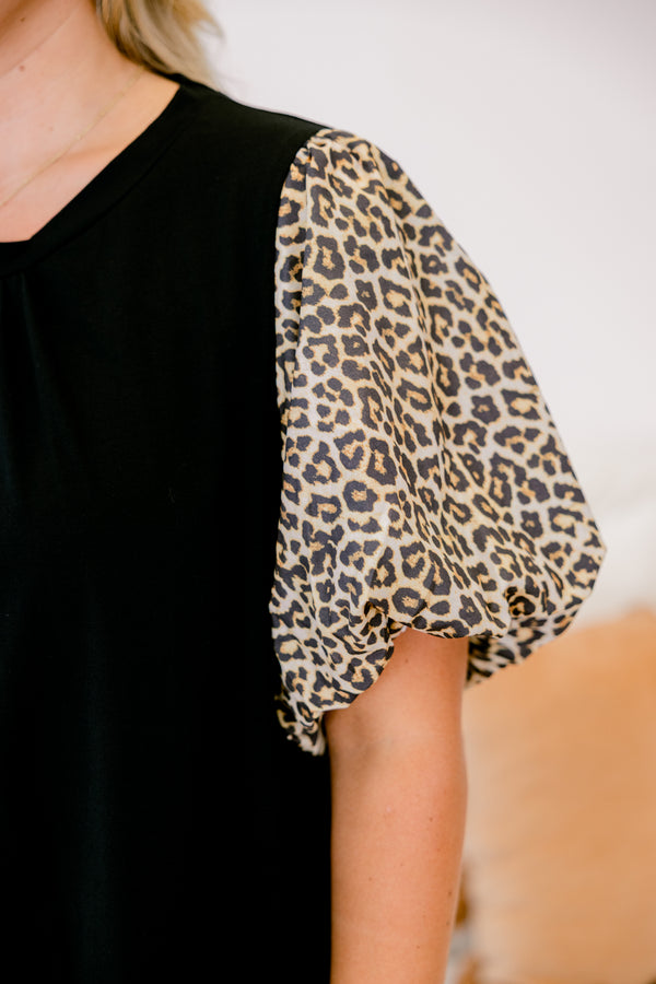 Chic soul plus size clothing, black top with bubble sleeves that have a leopard print on them 