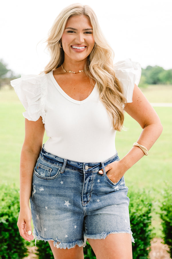Chic Soul plus size clothing, medium wash denim shorts with faint novelty star pattern and distressed edge