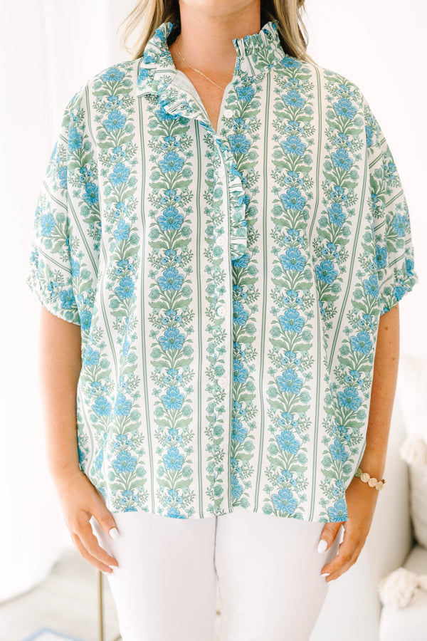 Blue floral stripe top with a ruffle collar, button-front ruffle trim, and  bubble sleeves.