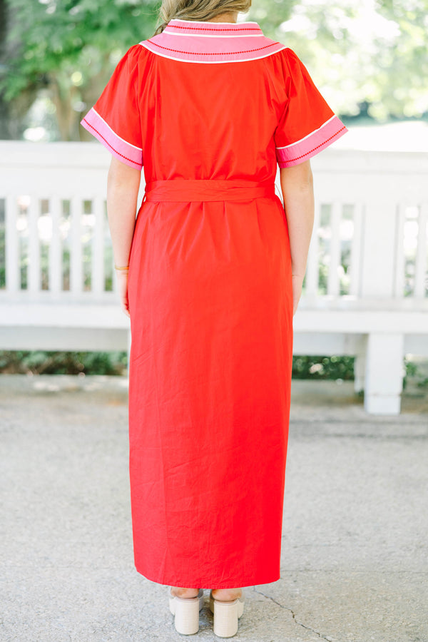 Plus Size red cotton midi dress with pink contrast trim, V-neckline, and adjustable waist belt.