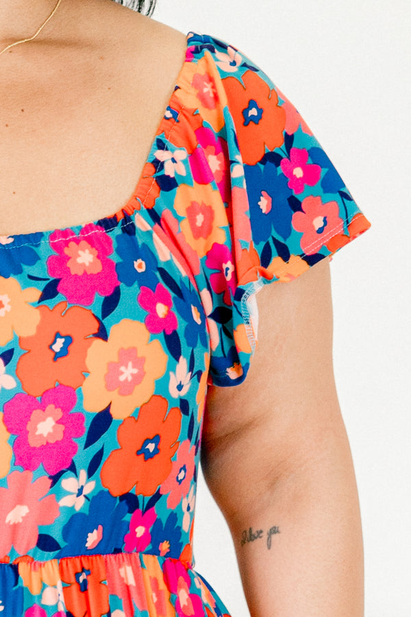 Chic Soul plus size clothing, blue and orange layered maxi dress with off-the-shoulder short sleeves and multi color floral pattern 