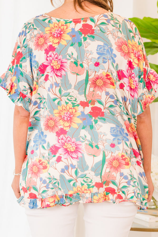 Chic Soul plus size clothing, short sleeve v-neckline cream mixed colored top with pink, blue, and yellow floral details