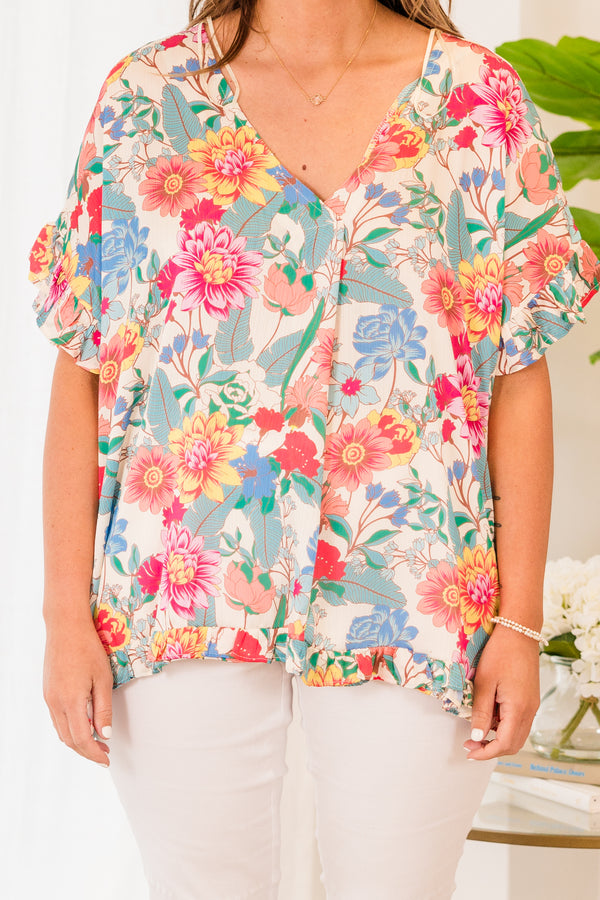 Chic Soul plus size clothing, short sleeve v-neckline cream mixed colored top with pink, blue, and yellow floral details