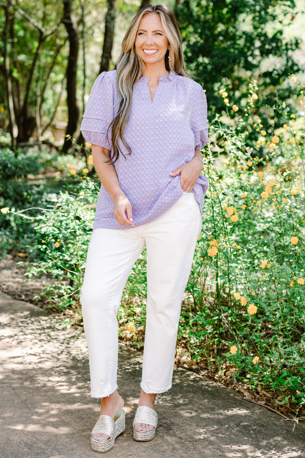 Chic Soul plus size clothing, short-puffed-sleeve light purple top with a textured spotted material and a split-v-neckline with ruffles along the neckline