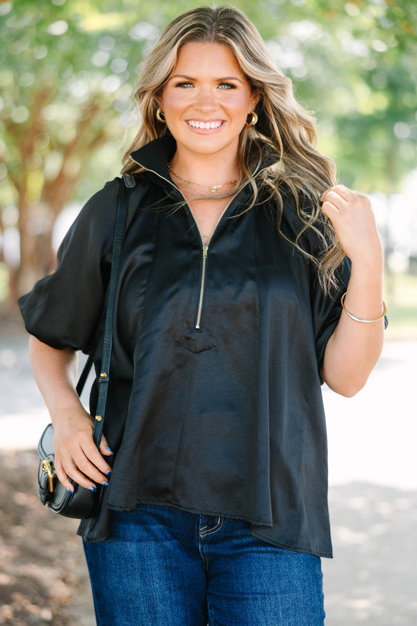 Plus Size black satin-finish top with a half-zip neckline, high collar, and short puff sleeves.