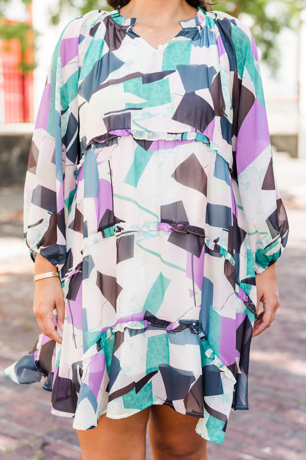 Chic Soul plus size clothing, long-sleeve ruffled purple multi-colored babydoll dress with smocked v-neckline and white and purple geometric abstract pattern