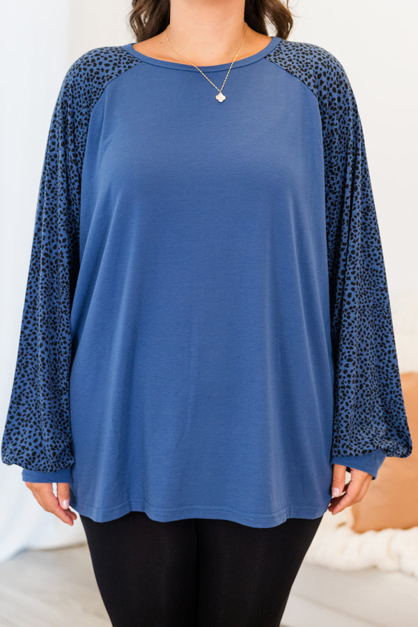 Chic Soul plus size clothing, blue long sleeve flowy top with round neckline with black dotted sleeves with cuff detail on sleeves