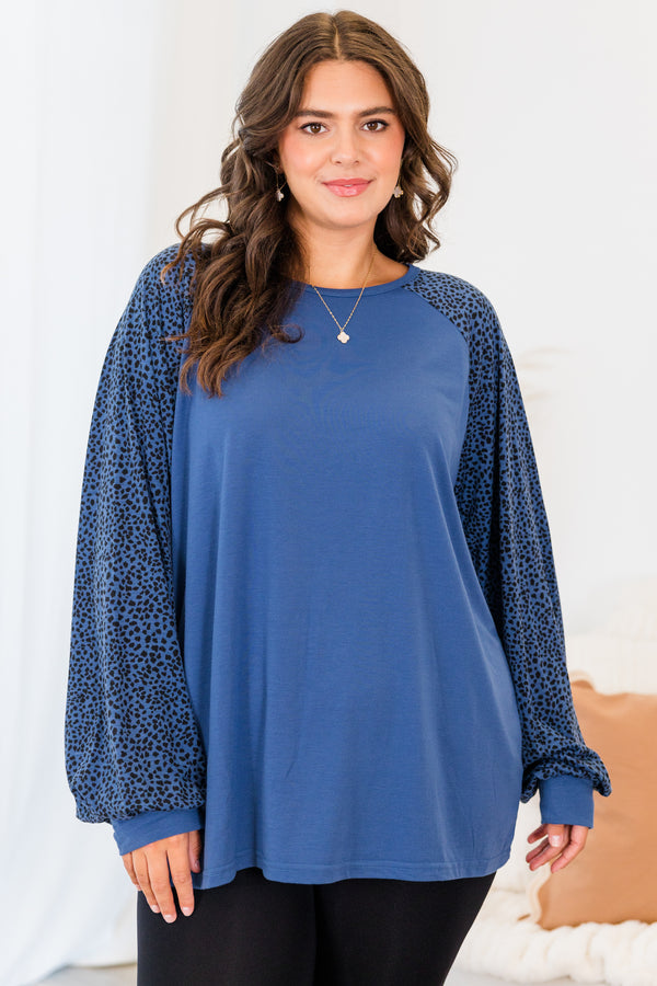 Chic Soul plus size clothing, blue long sleeve flowy top with round neckline with black dotted sleeves with cuff detail on sleeves