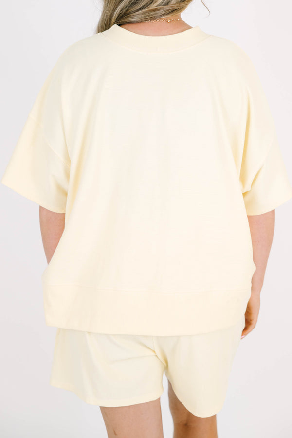 Plus Size banana yellow two-piece set with a short-sleeve ribbed top and matching pull-on shorts.