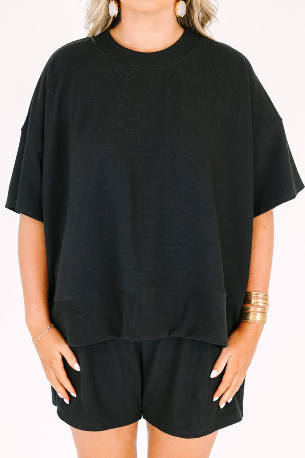 Plus Size black two-piece set featuring a short-sleeve ribbed top and matching pull-on shorts.