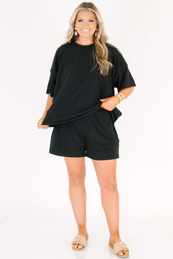 Plus Size black two-piece set featuring a short-sleeve ribbed top and matching pull-on shorts.