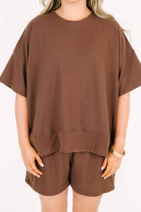 Plus Size brown two-piece set with a short-sleeve ribbed top and matching elastic pull-on shorts.