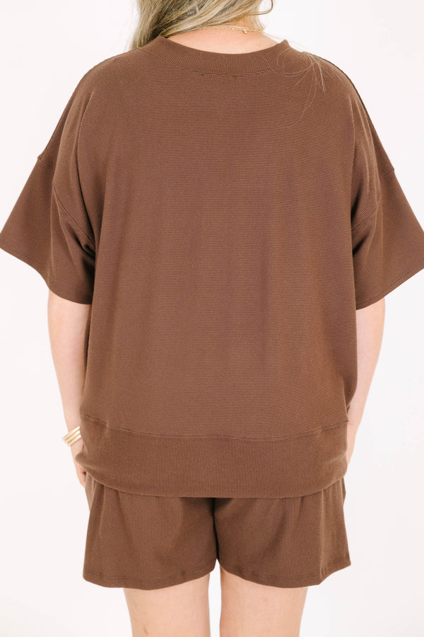 Plus Size brown two-piece set with a short-sleeve ribbed top and matching elastic pull-on shorts.