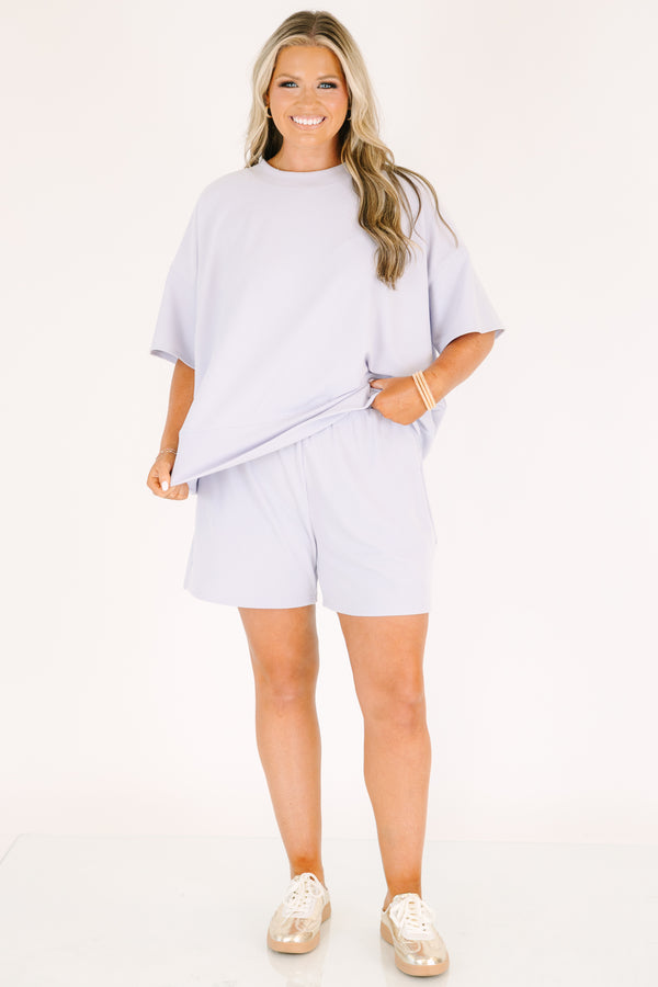 Plus Size lavender two-piece set with a short-sleeve ribbed top and matching pull-on shorts.