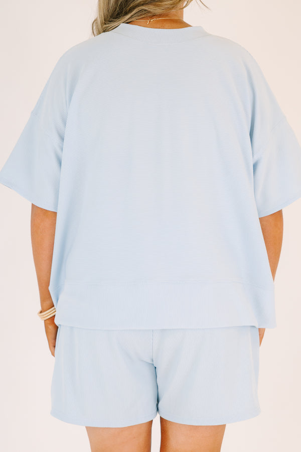 Plus Size light blue two-piece set with a ribbed short-sleeve top and matching pull-on shorts.
