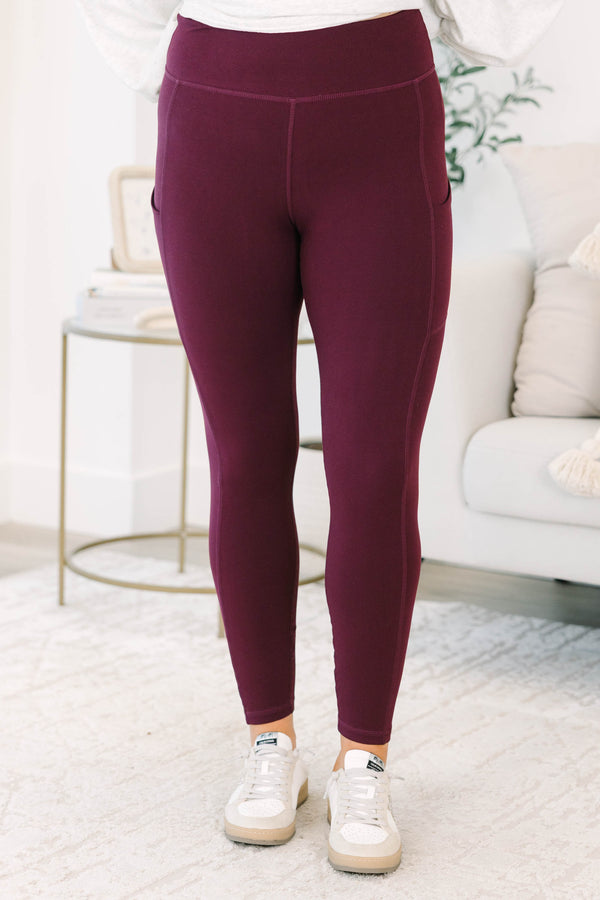 Plus Size high-waisted, full-length leggings in cassis with side pockets and a buttery-soft finish.
