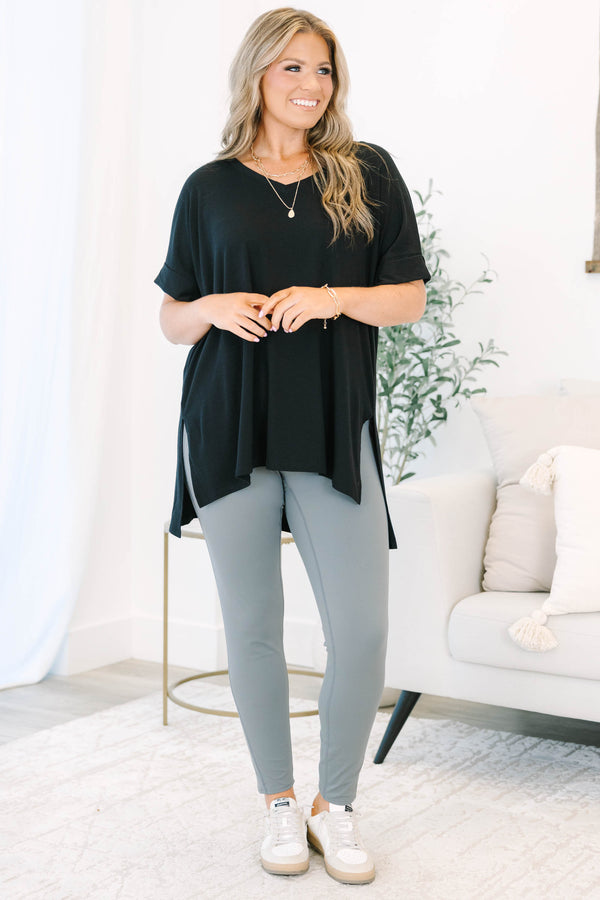 Plus size charcoal grey leggings in a stretchy nylon-spandex blend with a high-waisted fit.
