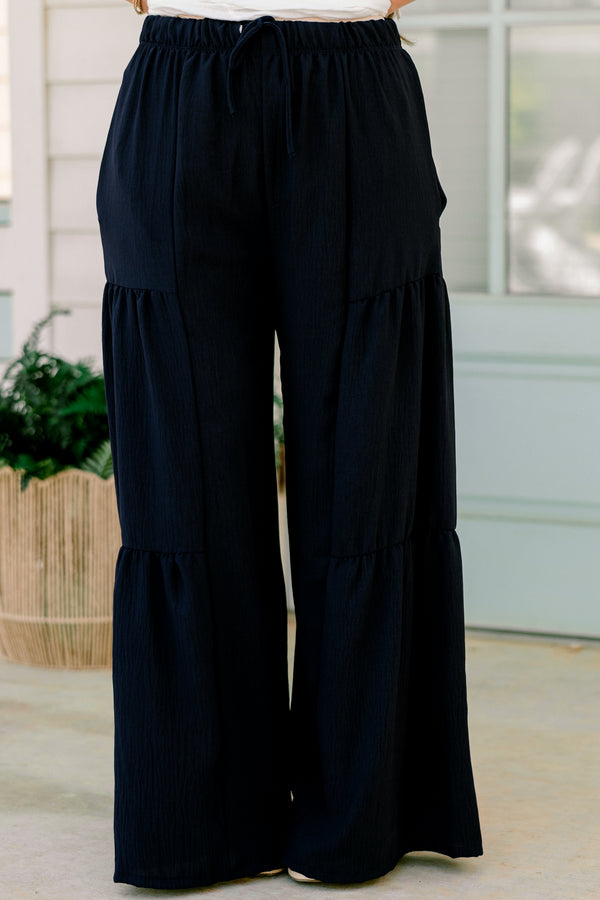 Chic Soul plus size clothing, high-waisted navy blue ruffled flowy pants with an elastic waistband 