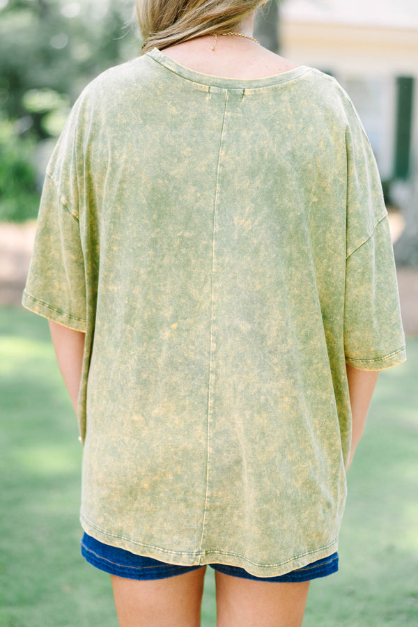 Plus size golden olive acid wash relaxed tee with a green alligator graphic.