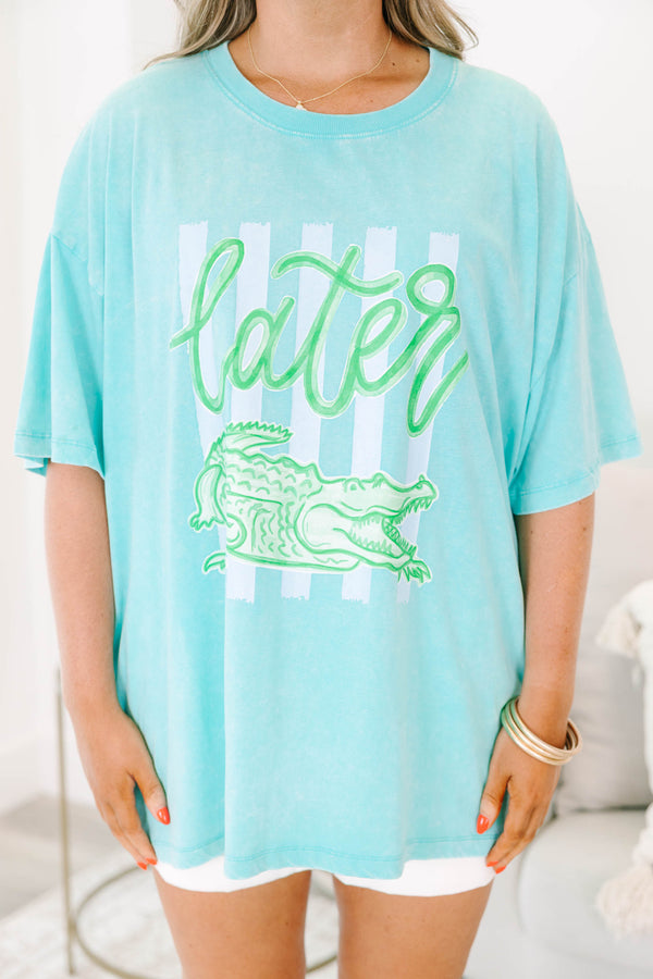 Plus Size mint acid wash relaxed tee with a green alligator graphic and white stripes.