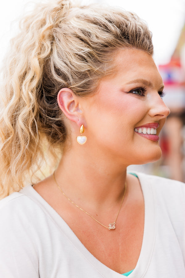 Chic Soul plus size clothing, thick teardrop shaped gold earring with a dangling pearl in the shape of a heart 