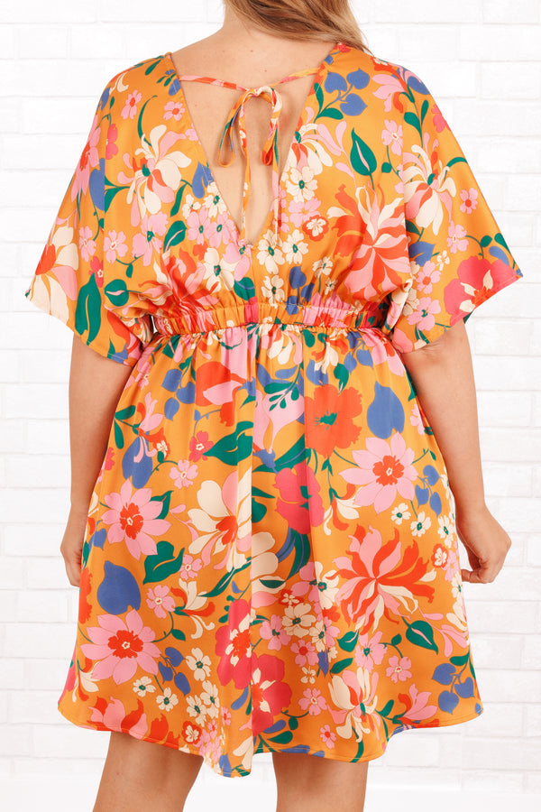 Chic Soul plus size clothing, orange babydoll flowy dress with multicolor floral pattern and a v neck