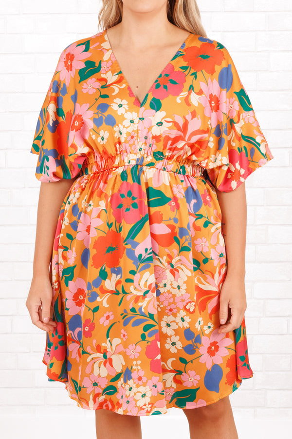 Chic Soul plus size clothing, orange babydoll flowy dress with multicolor floral pattern and a v neck