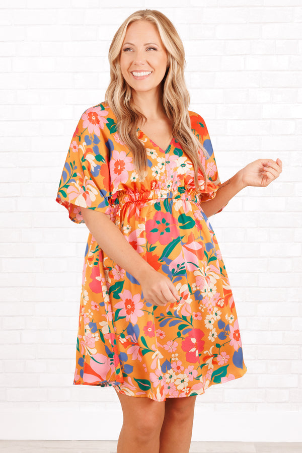 Chic Soul plus size clothing, orange babydoll flowy dress with multicolor floral pattern and a v neck