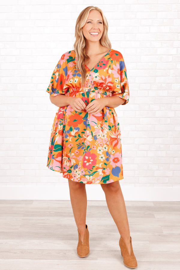 Chic Soul plus size clothing, orange babydoll flowy dress with multicolor floral pattern and a v neck