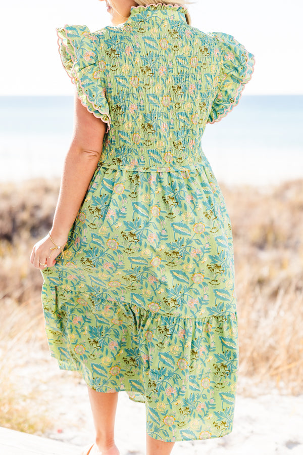 Chic Soul plus size clothing, short-flutter-sleeve green midi dress with a smocked bodice and a tiered skirt with a buttoned detailing down the front and a pink ric rac piping with a green tropical floral print pattern
