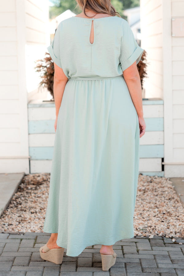 Plus Size sage green short sleeve maxi dress with a tied waistline and high-low tulip hem.