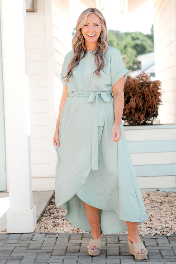 Plus Size sage green short sleeve maxi dress with a tied waistline and high-low tulip hem.