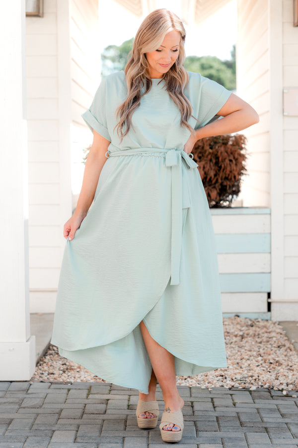 Plus Size sage green short sleeve maxi dress with a tied waistline and high-low tulip hem.
