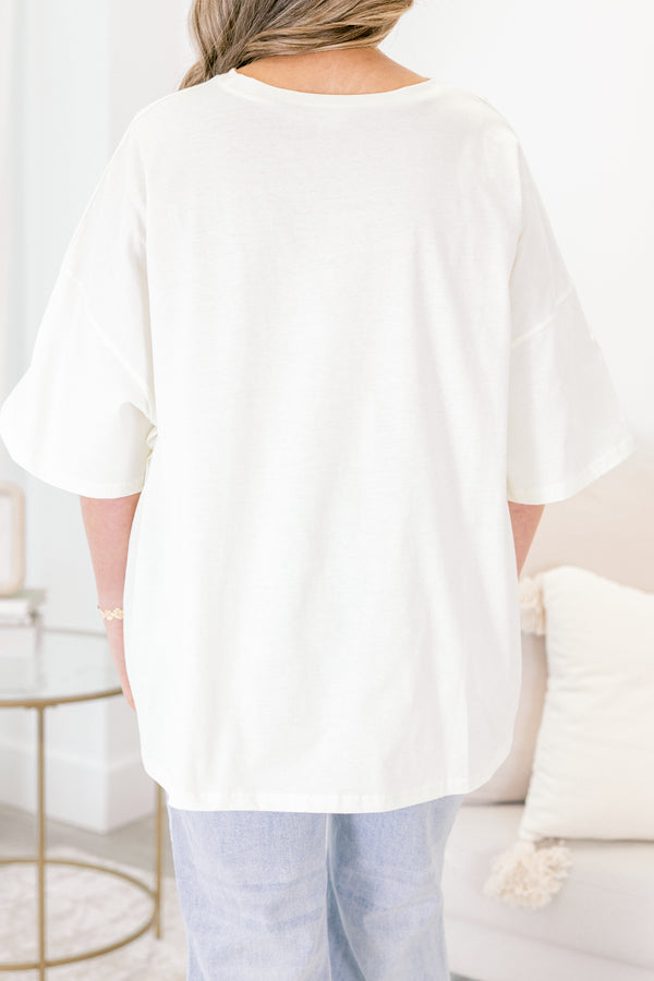 Chic Soul plus size clothing, ivory short sleeve graphic tee with a brown leopard bow graphic on the center of the tee 
