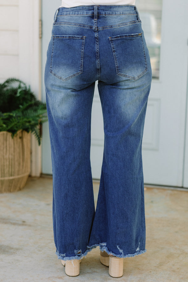 Chic Soul plus size clothing, medium wash bootcut jeans with raw distressed hem