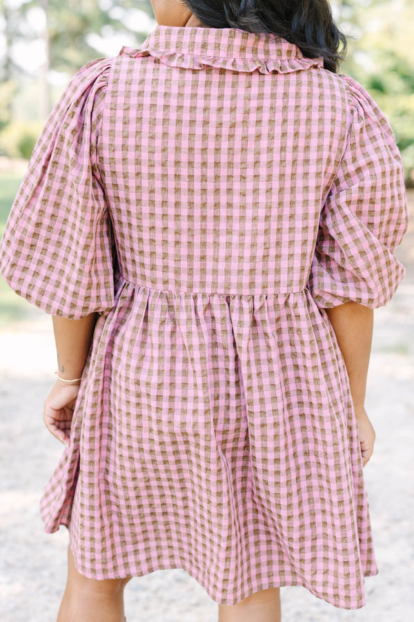 Plus Size mauve and brown gingham babydoll dress with puff sleeves, a collar, and button-down front.
