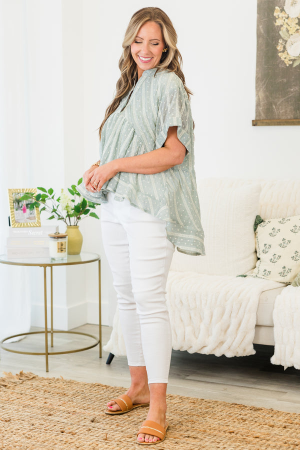 Chic Soul plus size clothing, short-cuffed-sleeve teal green ruffled baby doll top with a split-v-neckline and a high-low hemline with a striped polka dotted abstract pattern 
