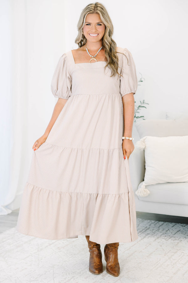 Plus Size ivory striped tiered maxi dress with a square neckline and puff sleeves.