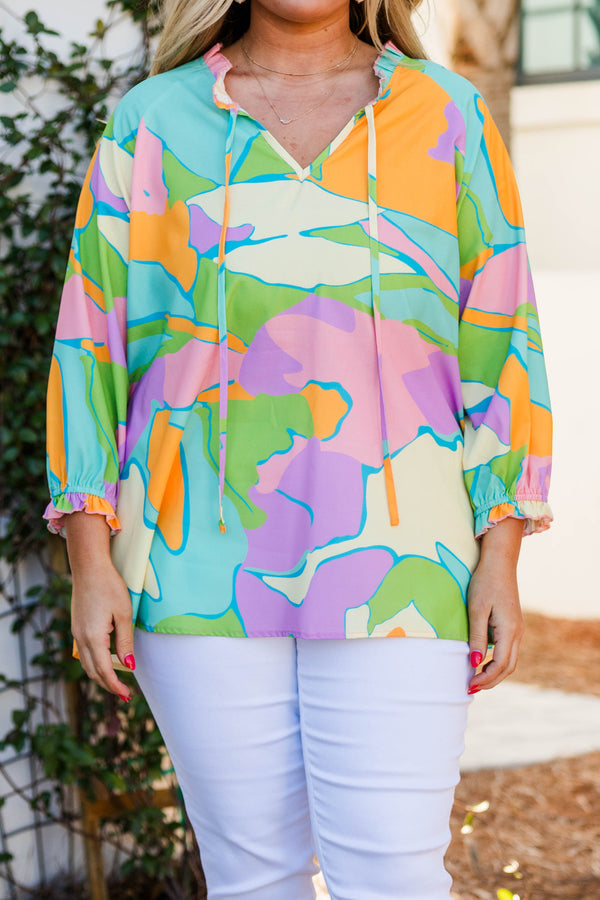 Chic Soul plus size clothing, multi color long sleeve top with drawstring v-neckline and ruched cuffs 