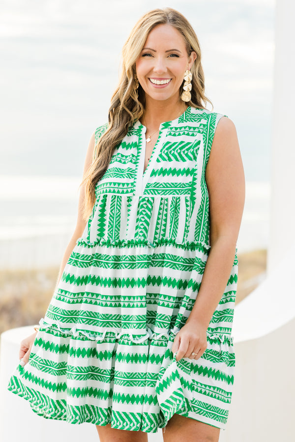 Chic Soul plus size clothing, sleeveless green ruffled baby doll dress with a split-v-neckline and a white and green aztec pattern