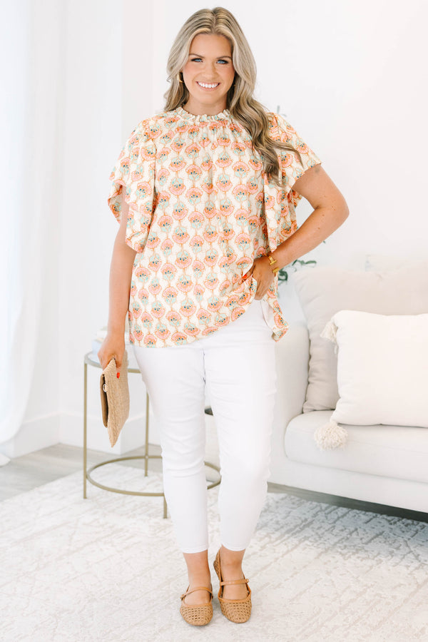 Chic Soul plus size clothing, ivory short sleeve top with light pink/teal paisley design with mock neck with ruffle sleeves