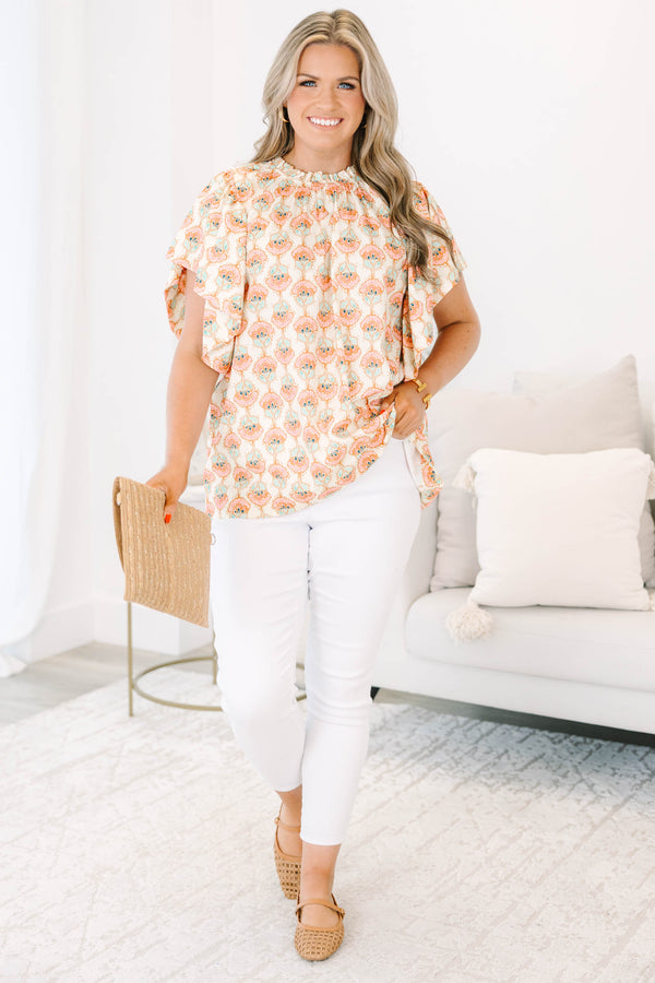 Chic Soul plus size clothing, ivory short sleeve top with light pink/teal paisley design with mock neck with ruffle sleeves