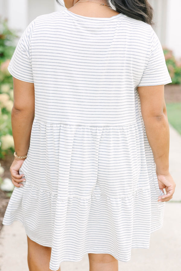Plus Size gray and white striped babydoll dress with short sleeves and a tiered style