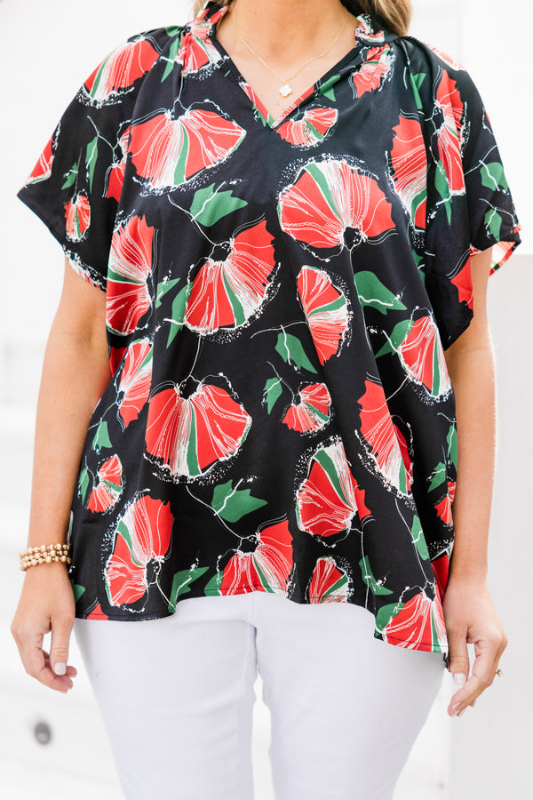 Chic Soul plus size clothing, short-sleeve black top with a split-v-neckline and a red and green abstract floral pattern 